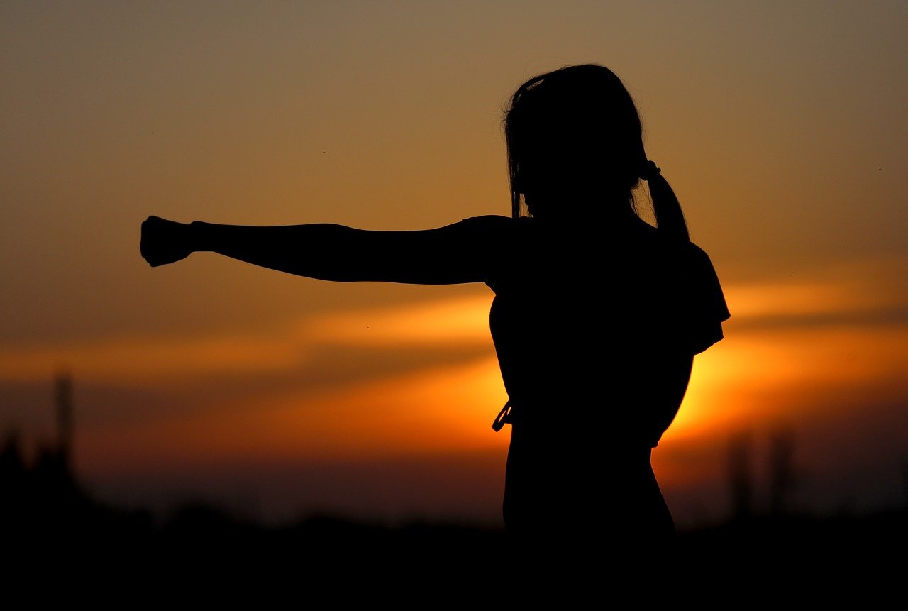Woman shadow boxing